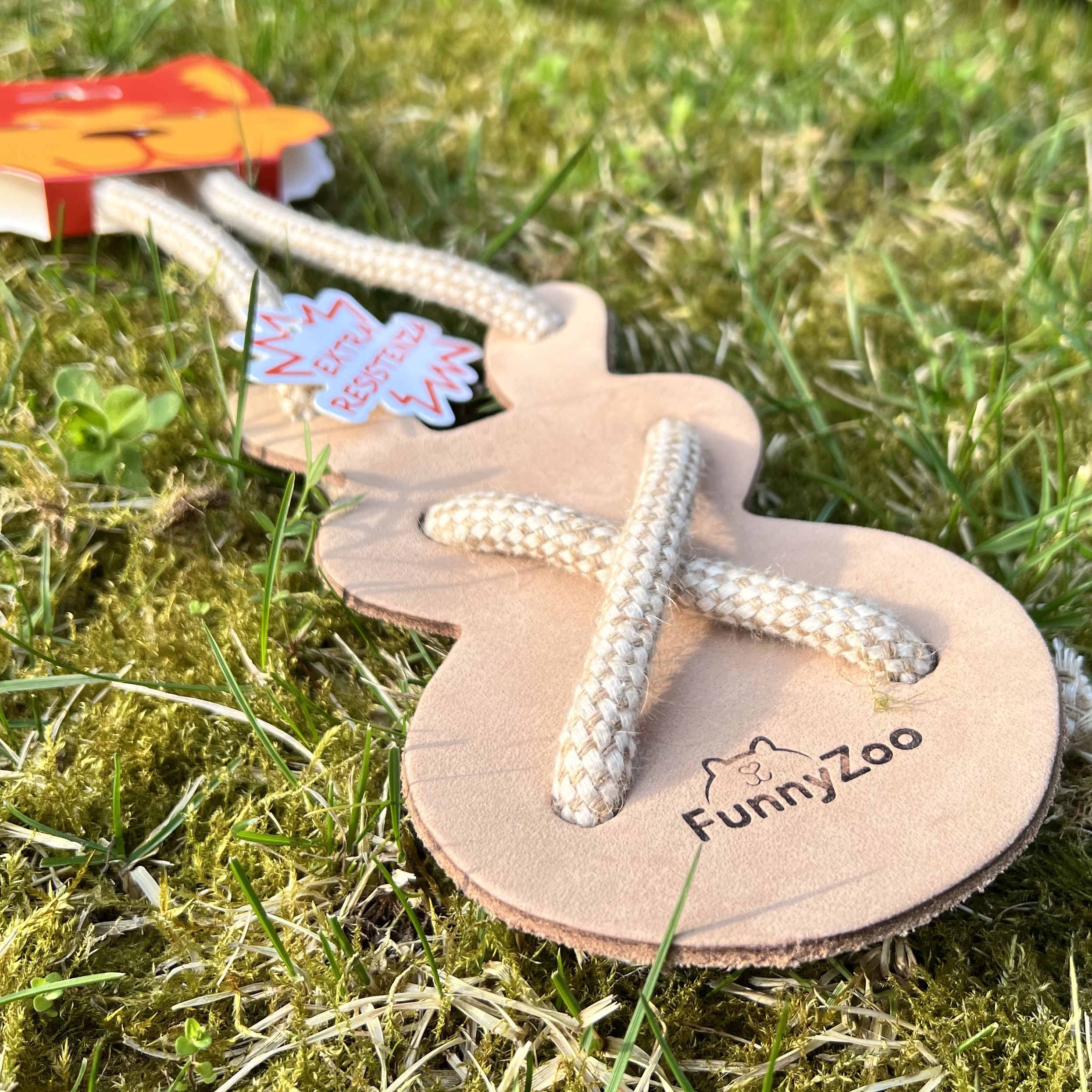 Natural toy for dogs in harness leather